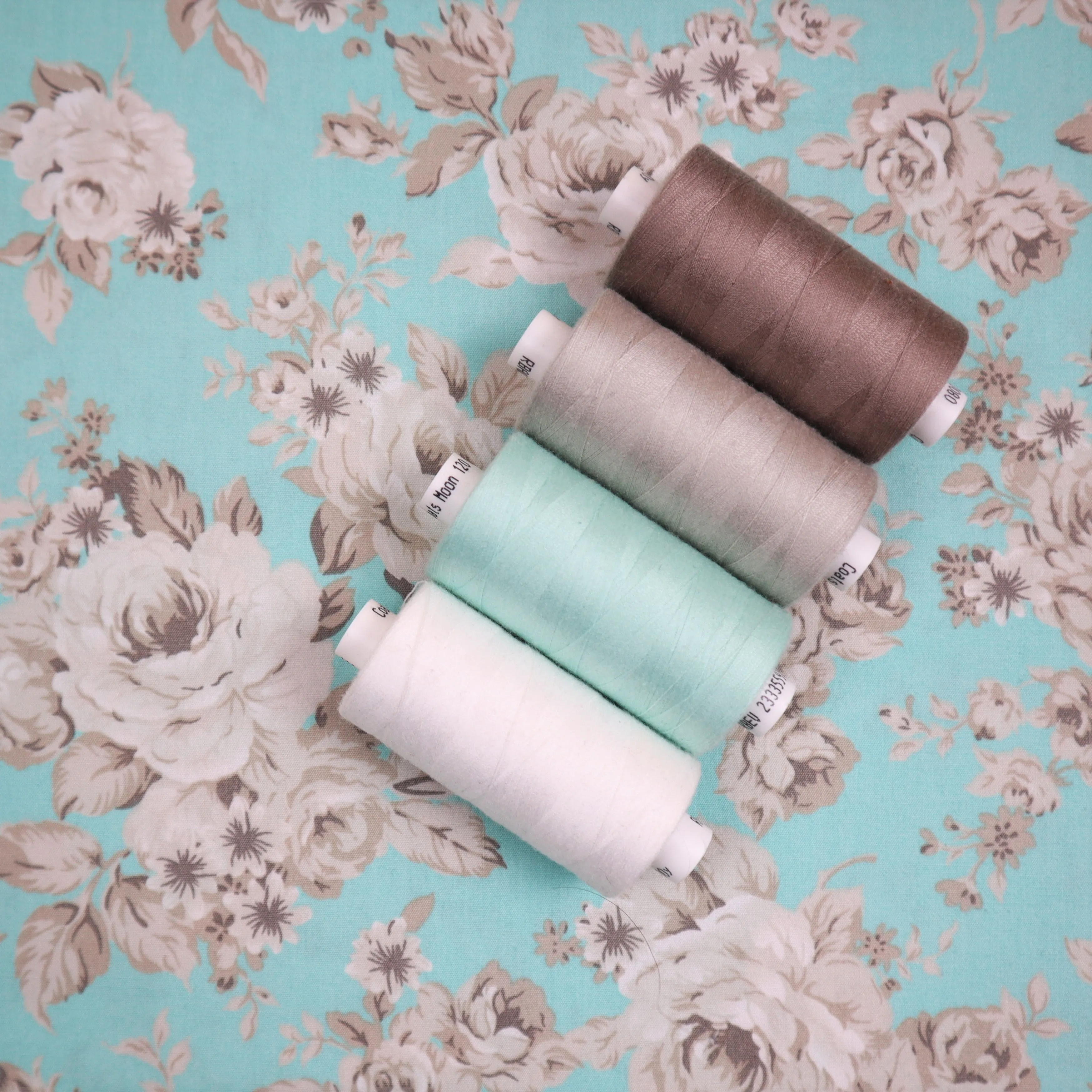 100% Cotton in Aqua Rose Print